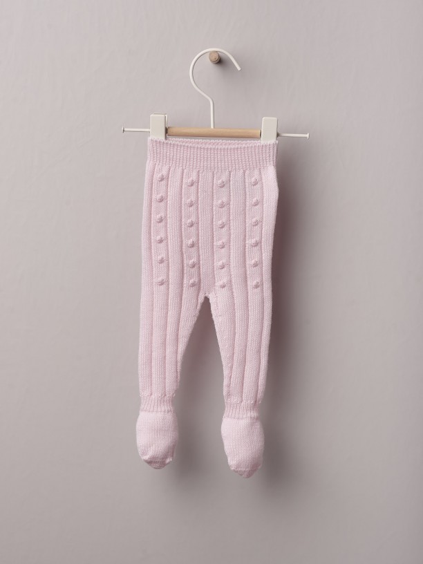 Calças com pé tricotadas