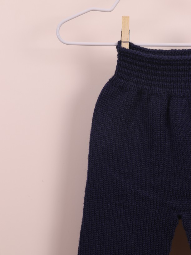 Knitted trousers with hem