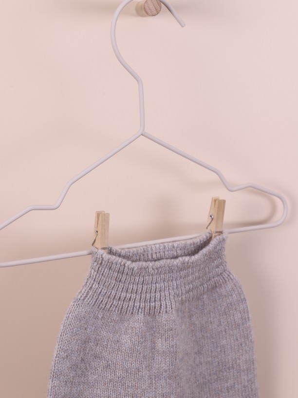Calças tricotadas