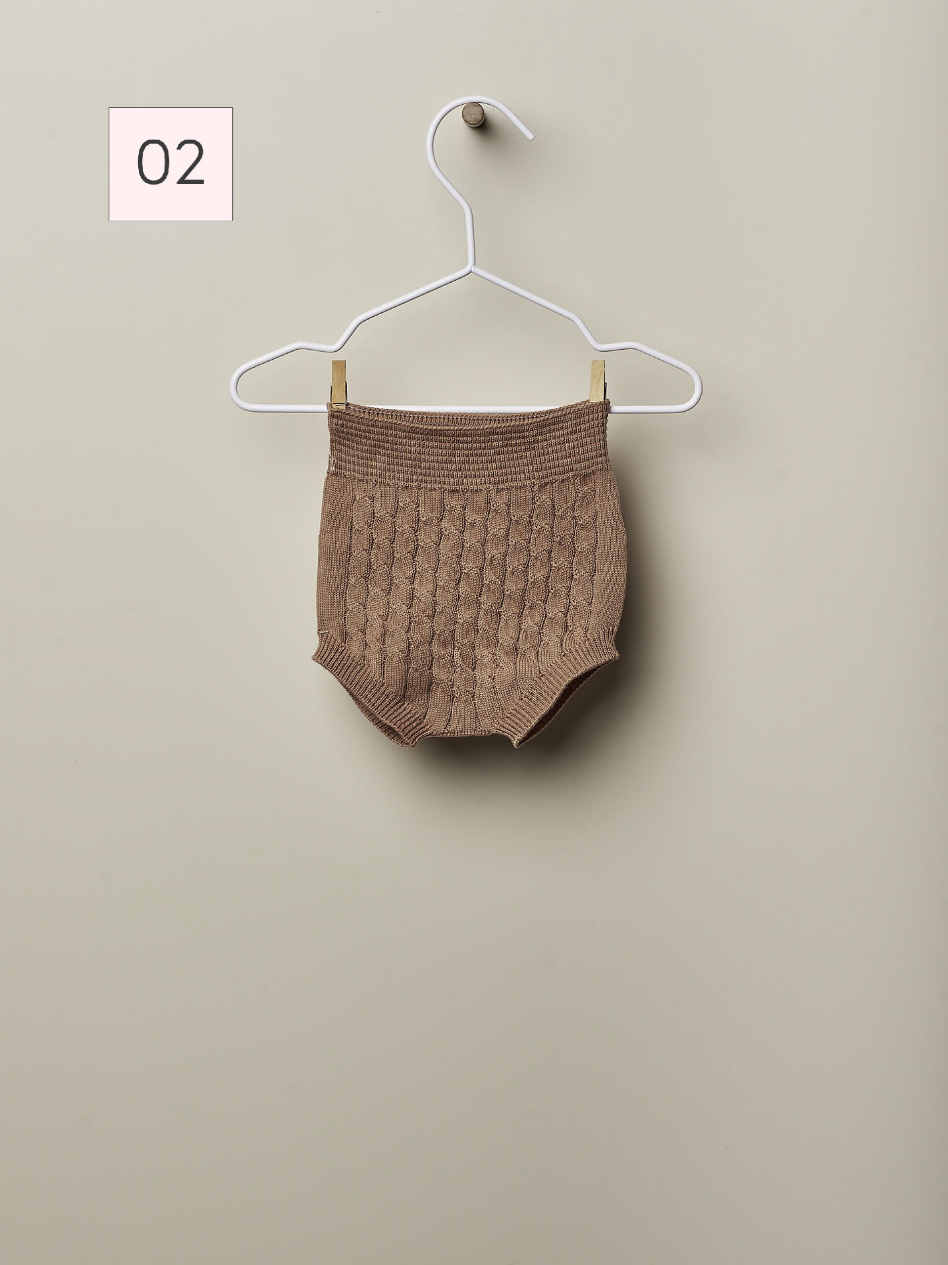 Tapa fralda tricotado