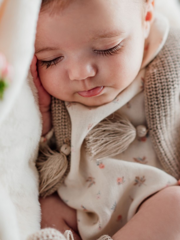 Knitted baby vest