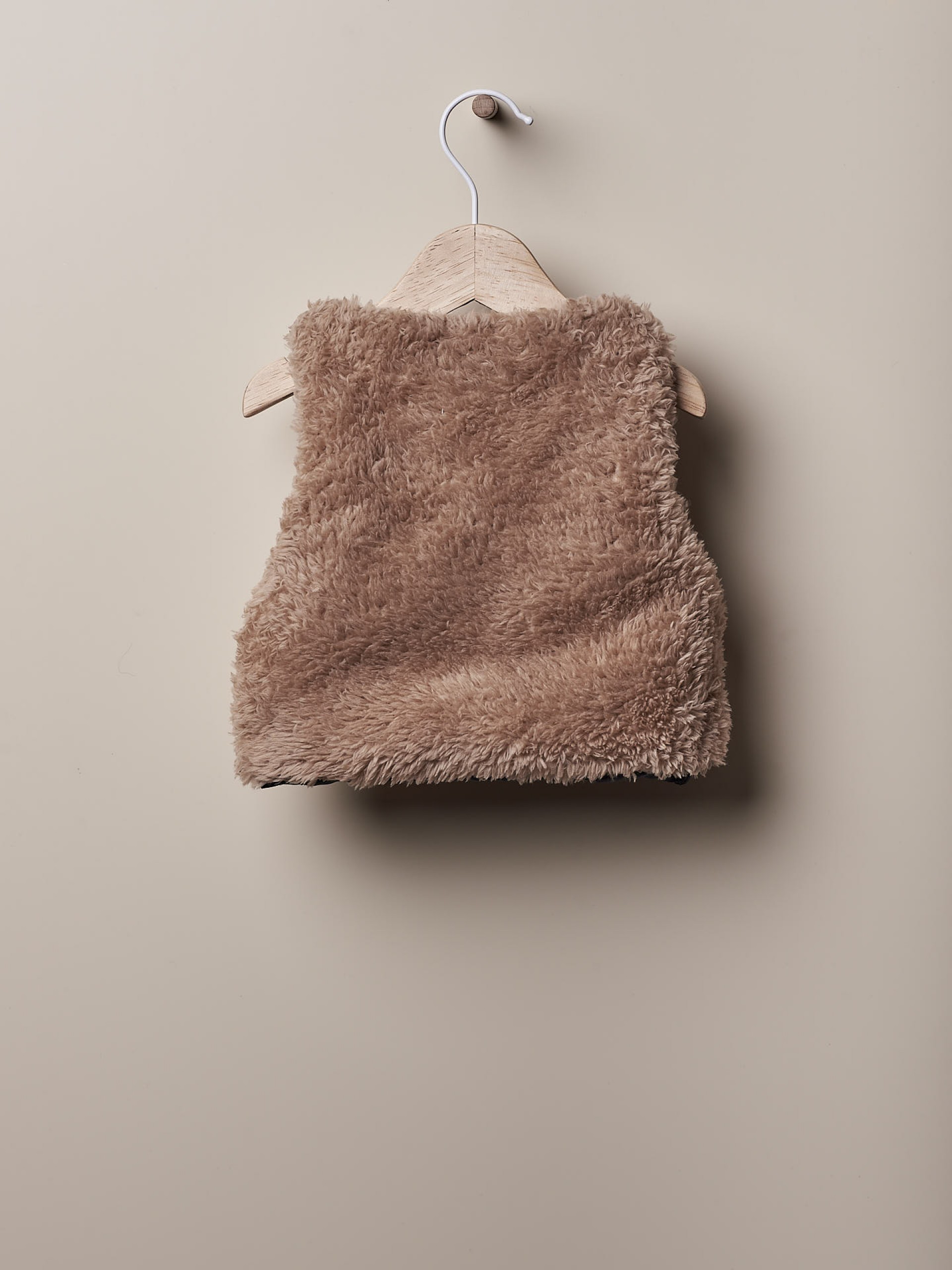 Colete tricotado  de pêlo