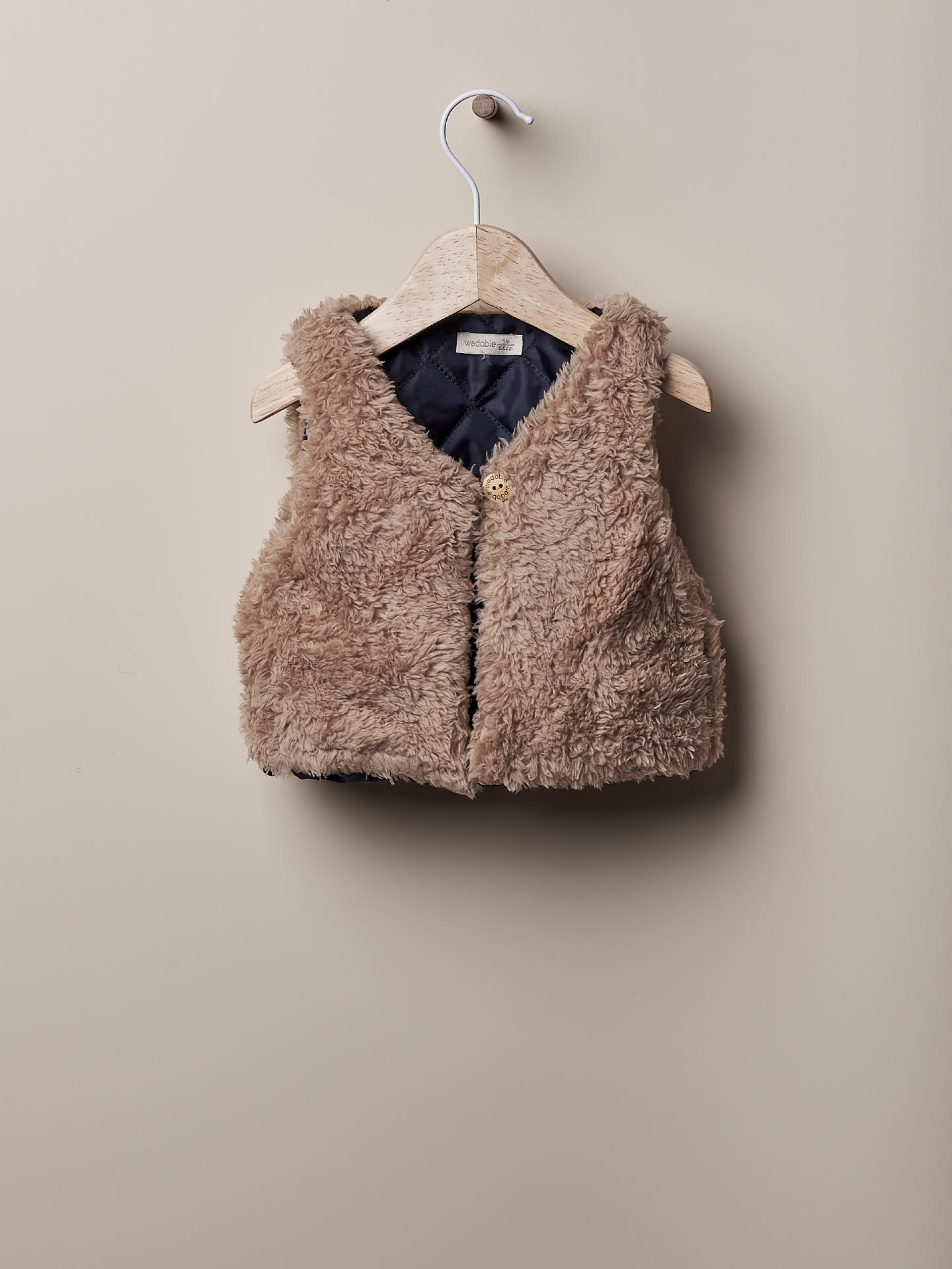 Colete tricotado  de pêlo