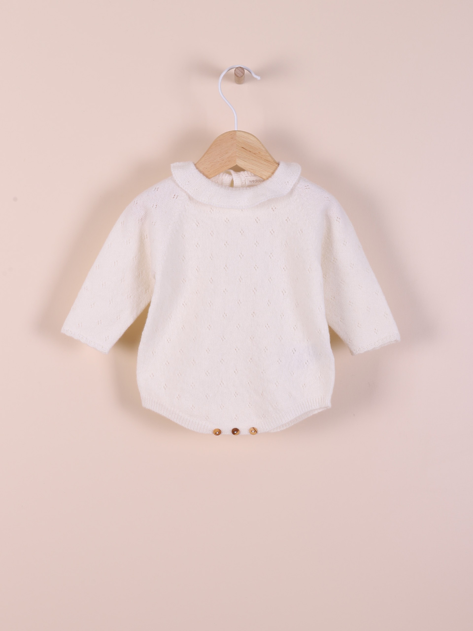 Fofo tricotado de lã