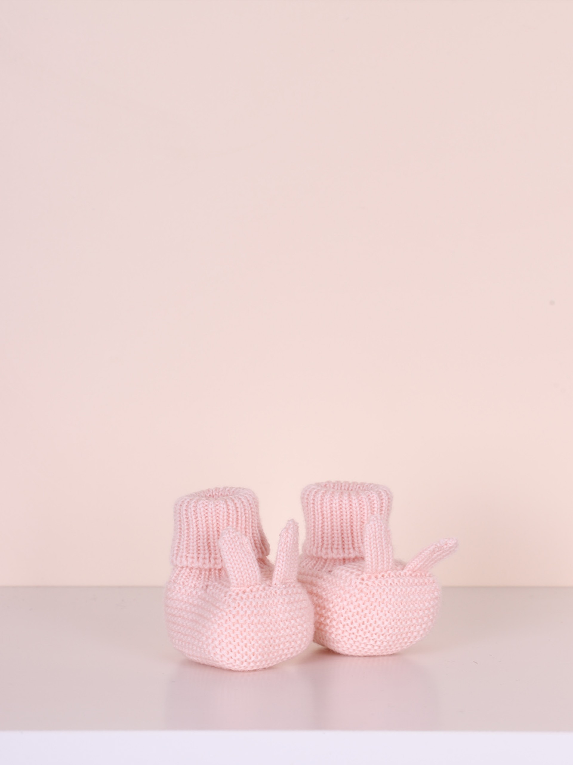 Carapins tricotados de lã