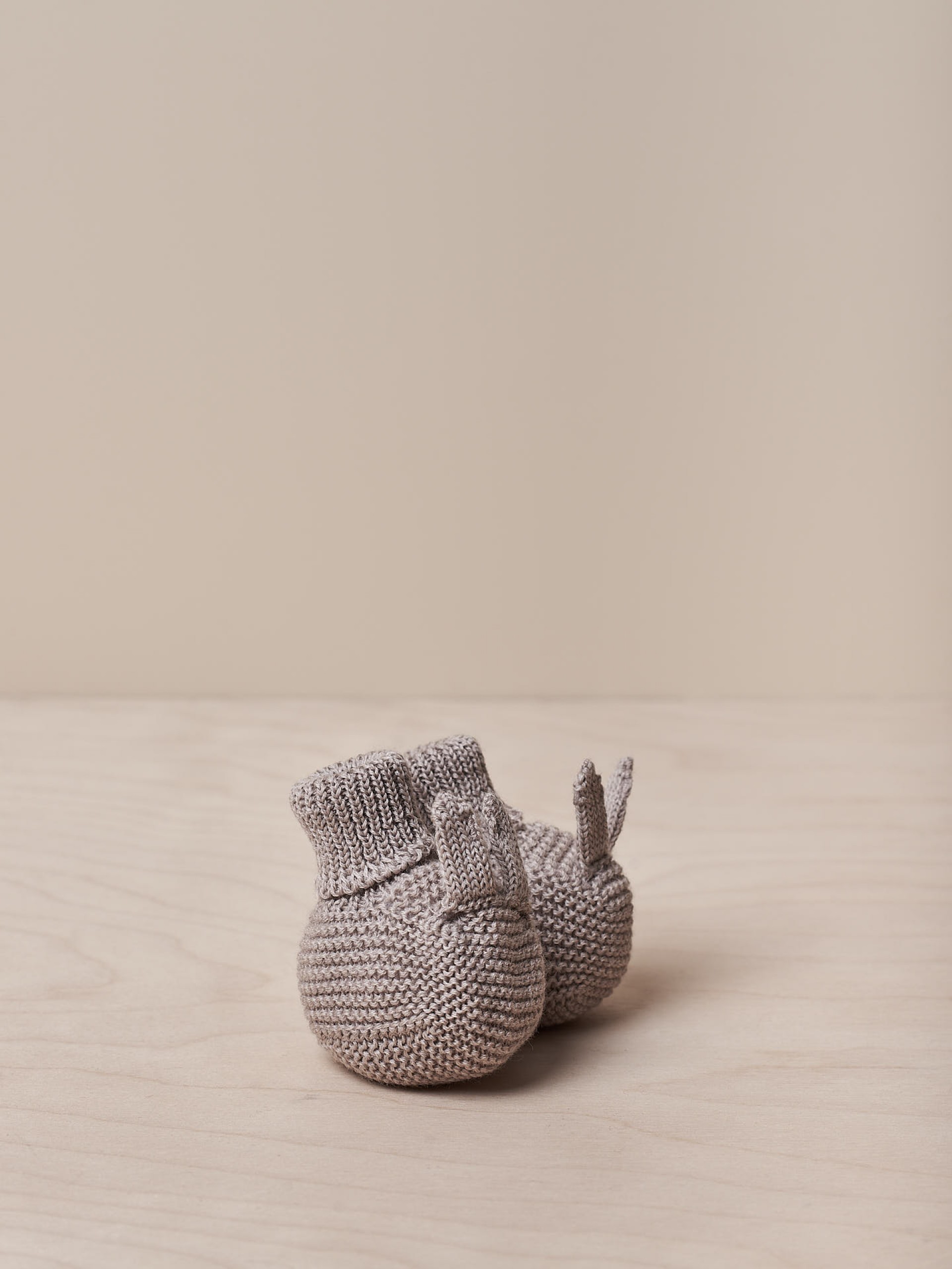 Carapins tricotados de lã