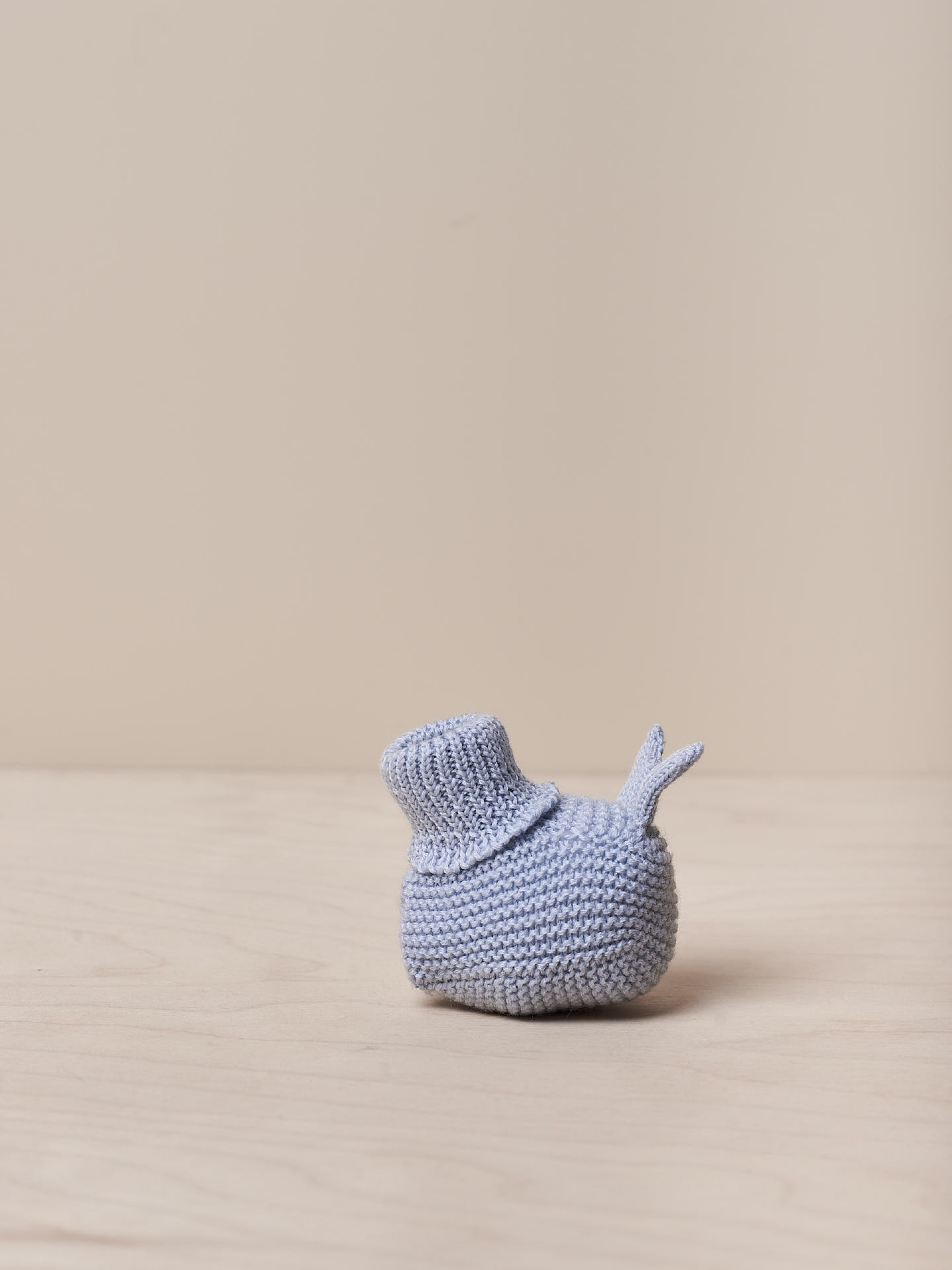 Carapins tricotados de lã