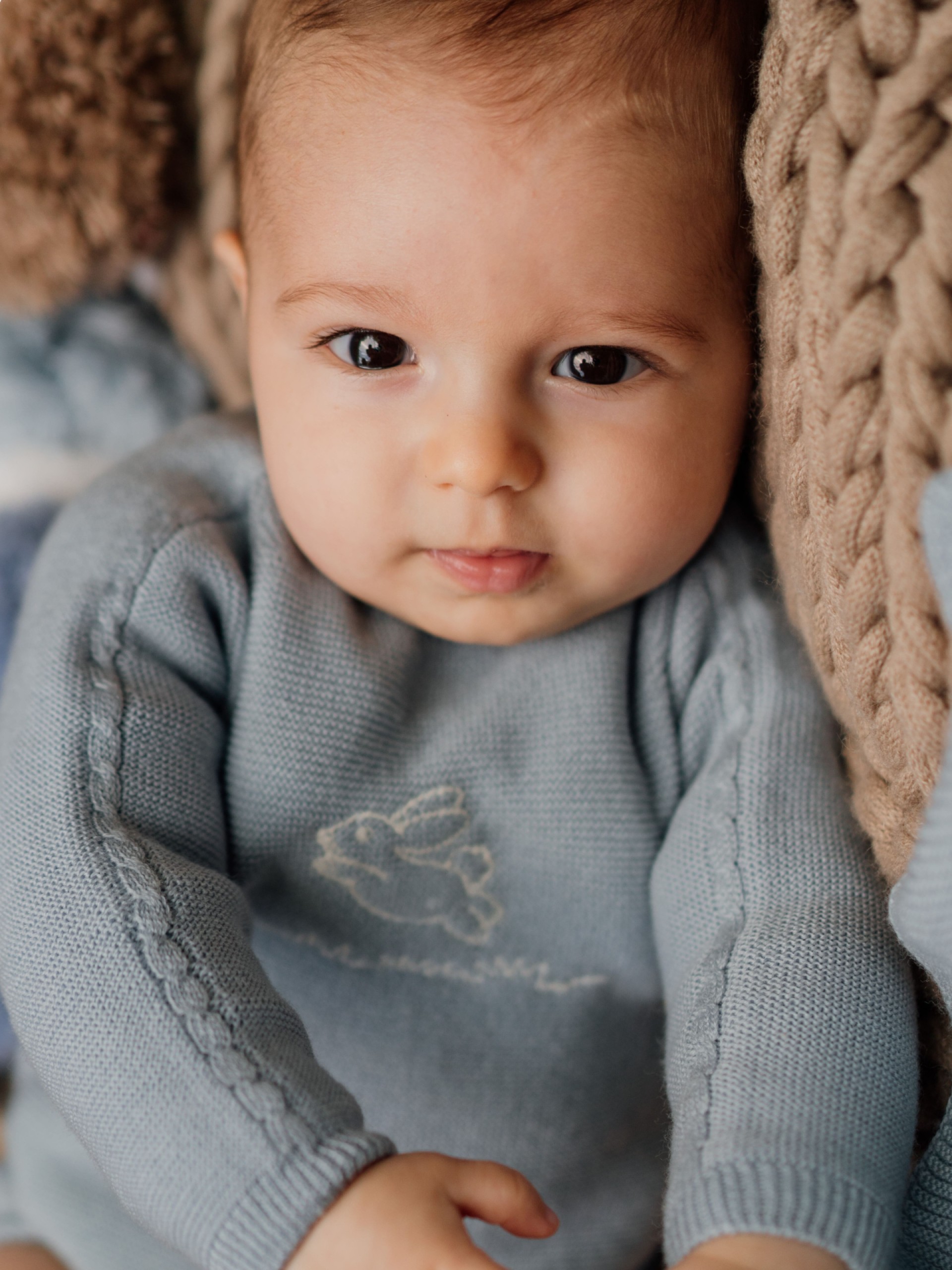 Babygrow tricotado de lã