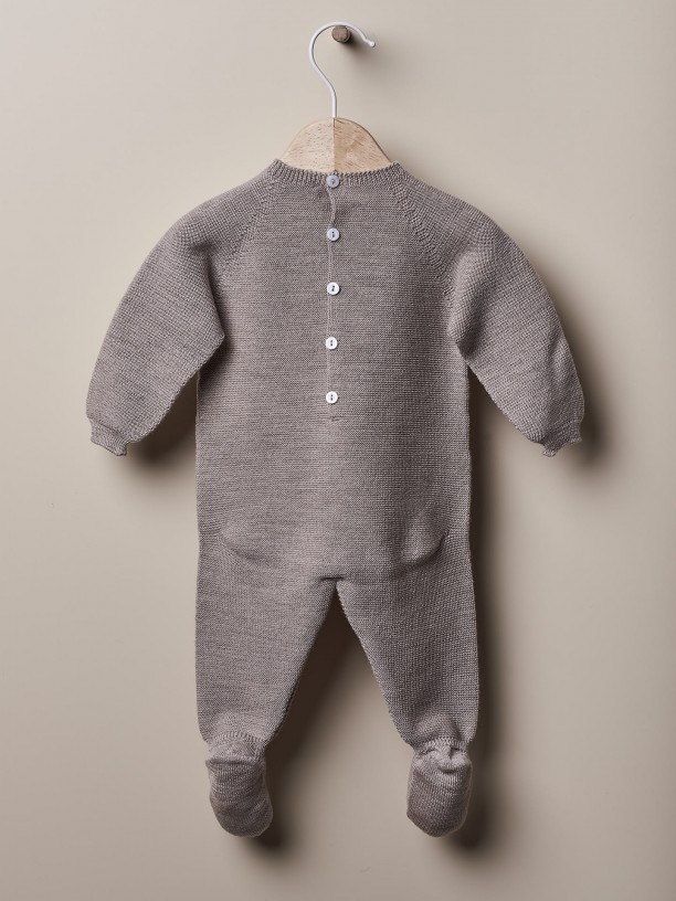 Knitted wool babygrow