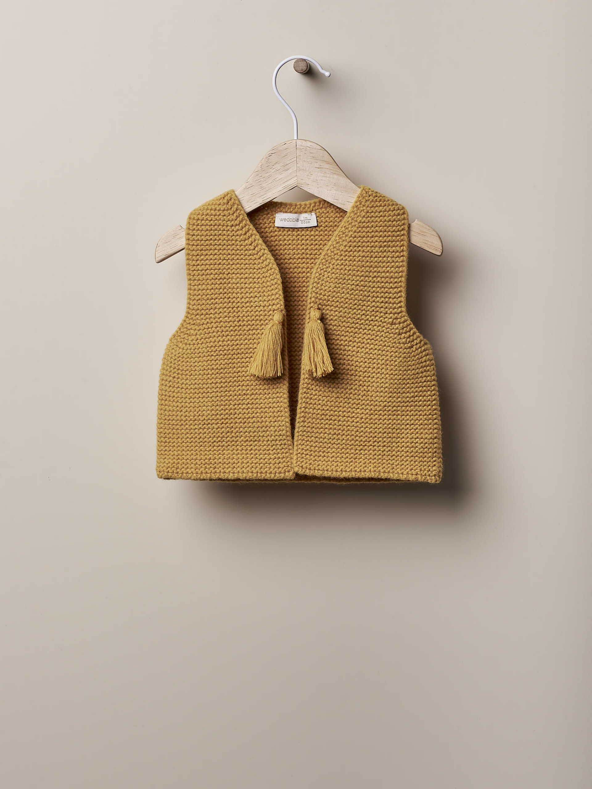 Colete tricotado de lã