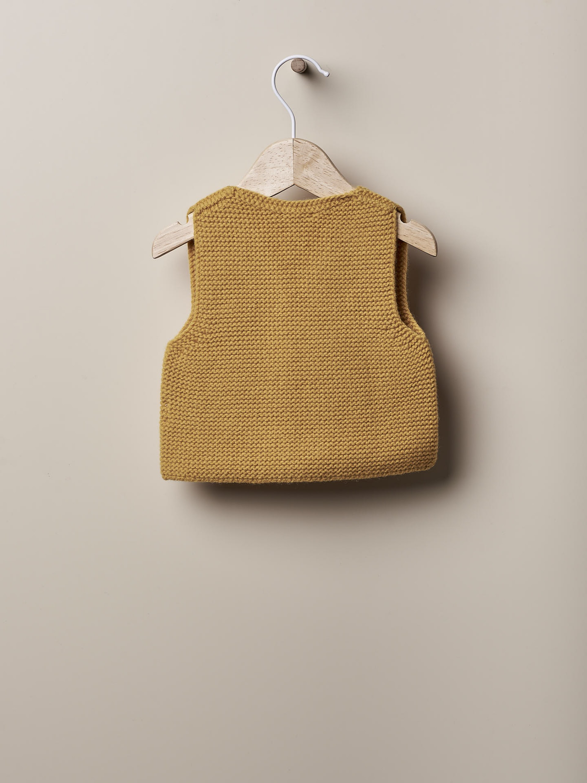 Colete tricotado de lã