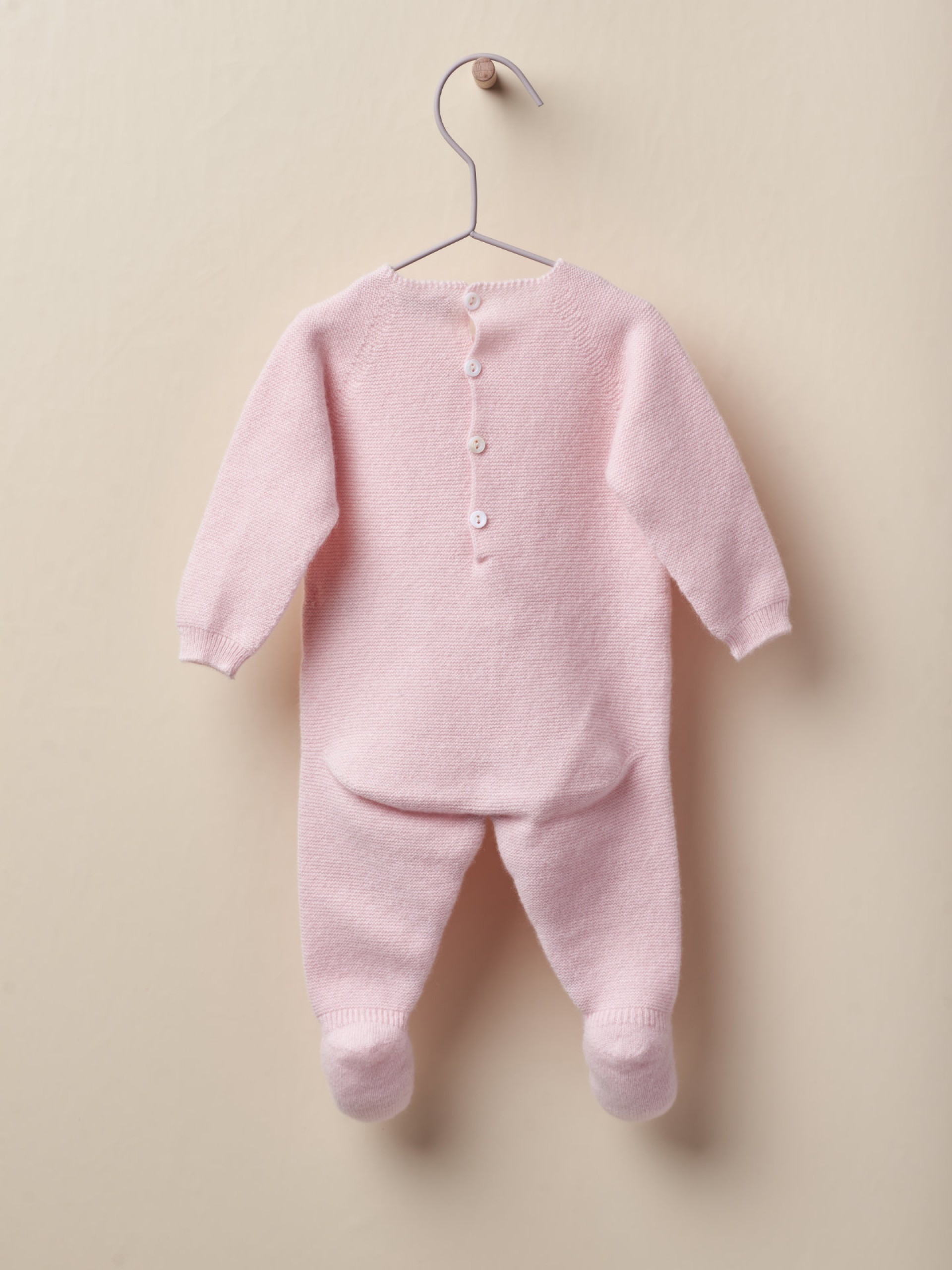 Knitted wool babygrow