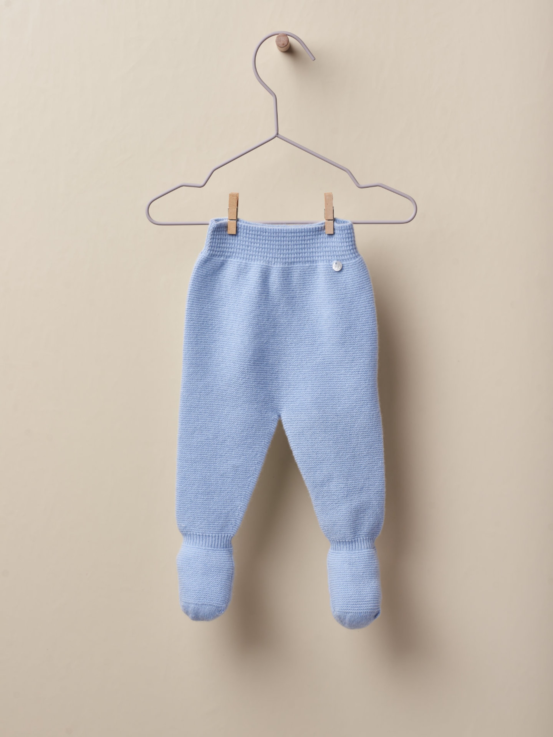 Calças com pé em lã