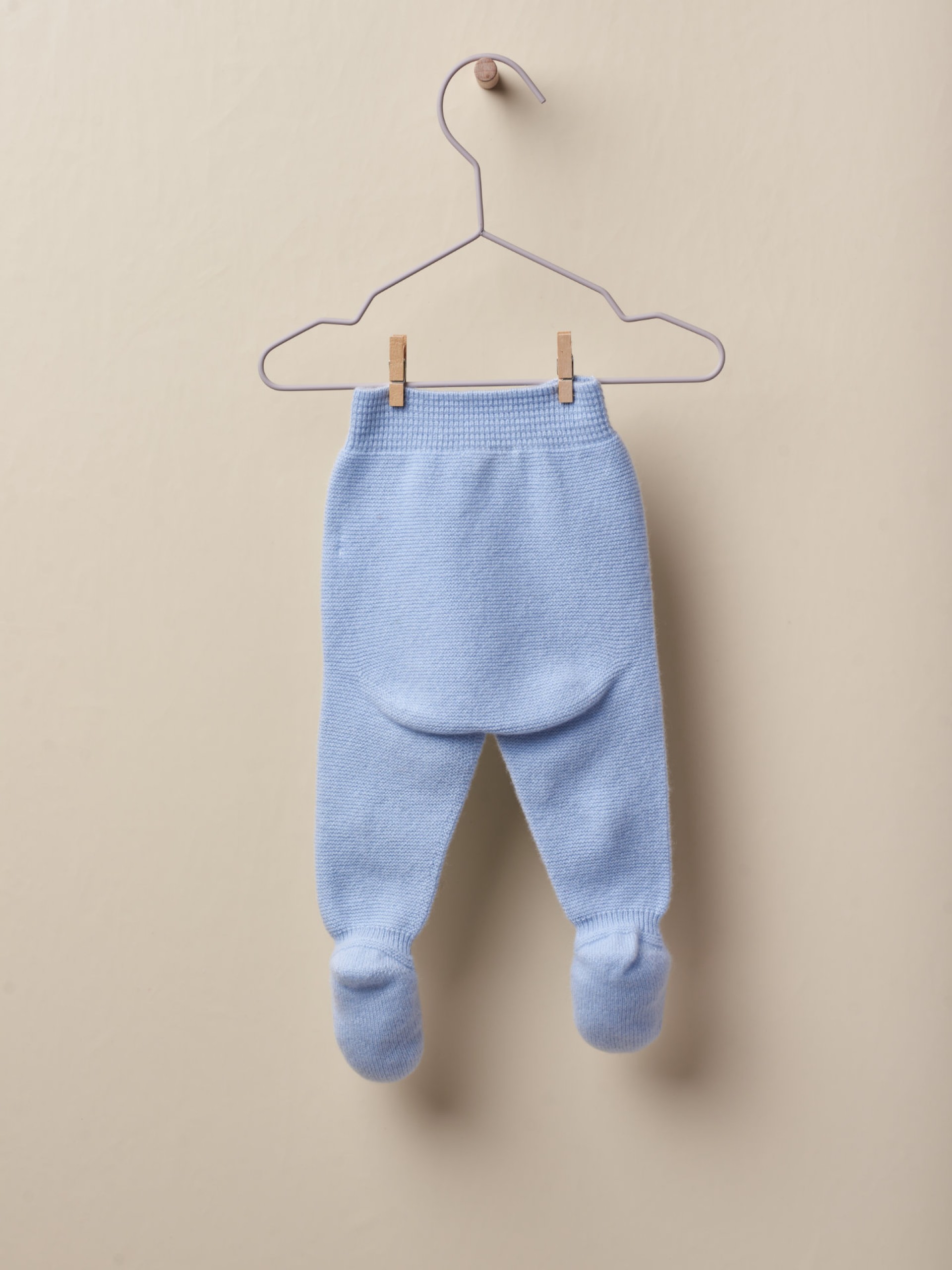 Calças com pé em lã