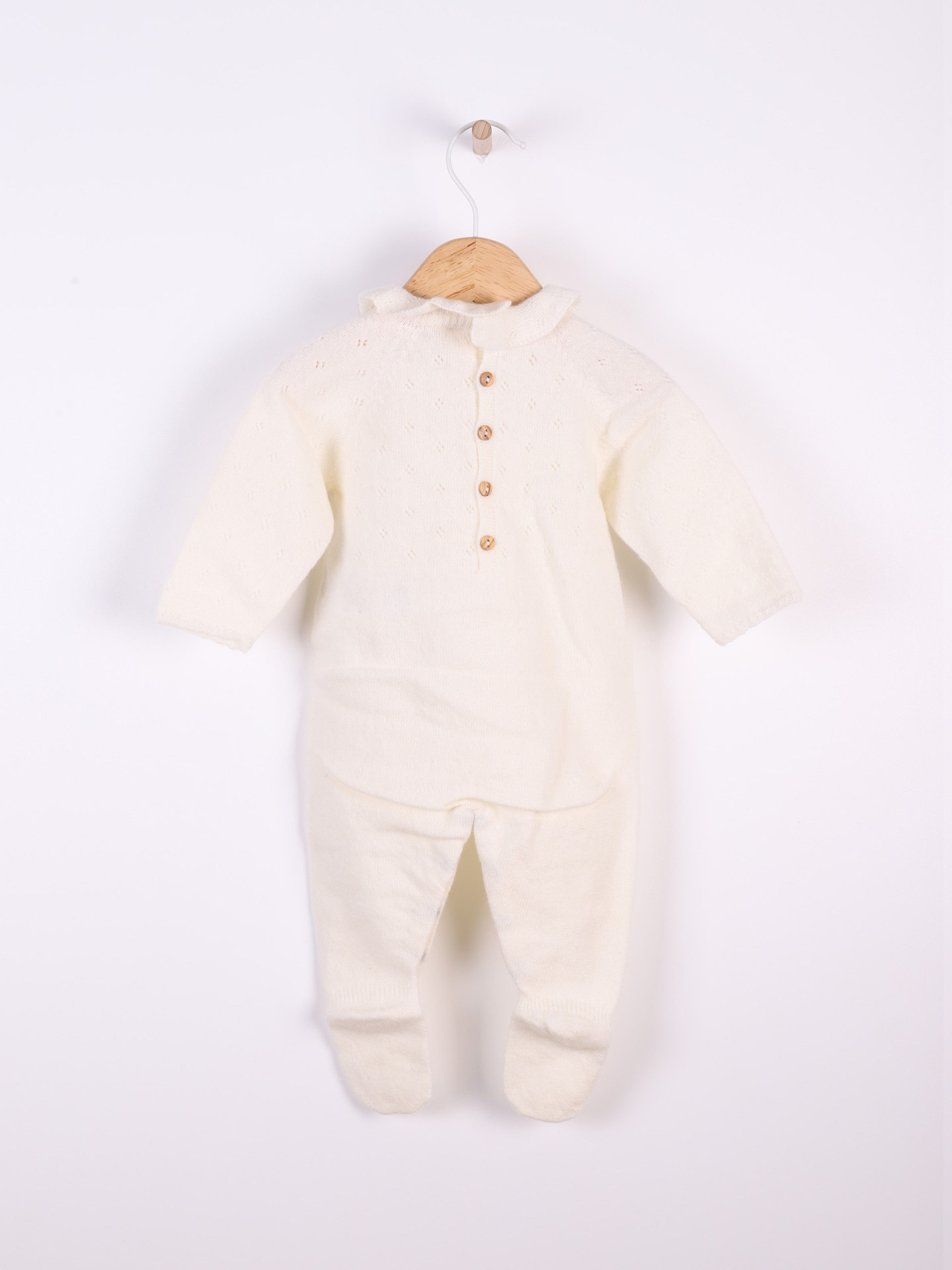 Knitted wool babygrow
