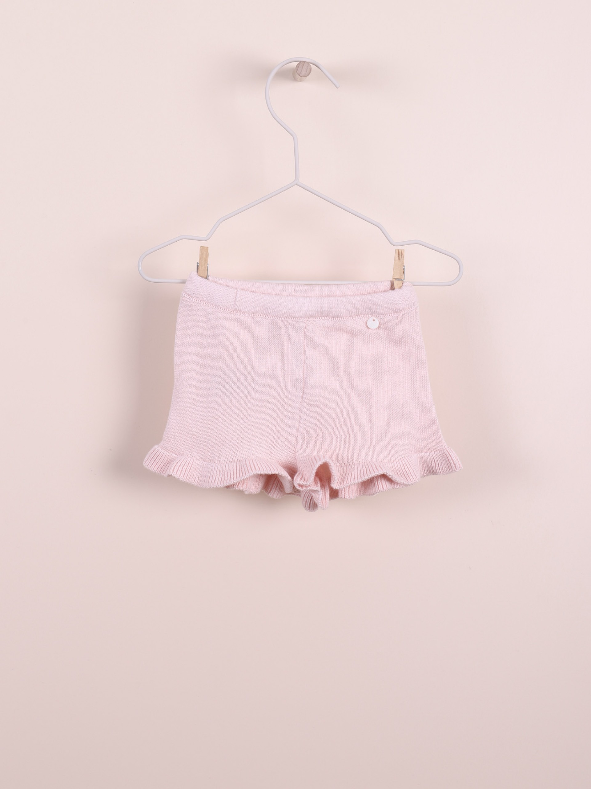 Calções com folhos