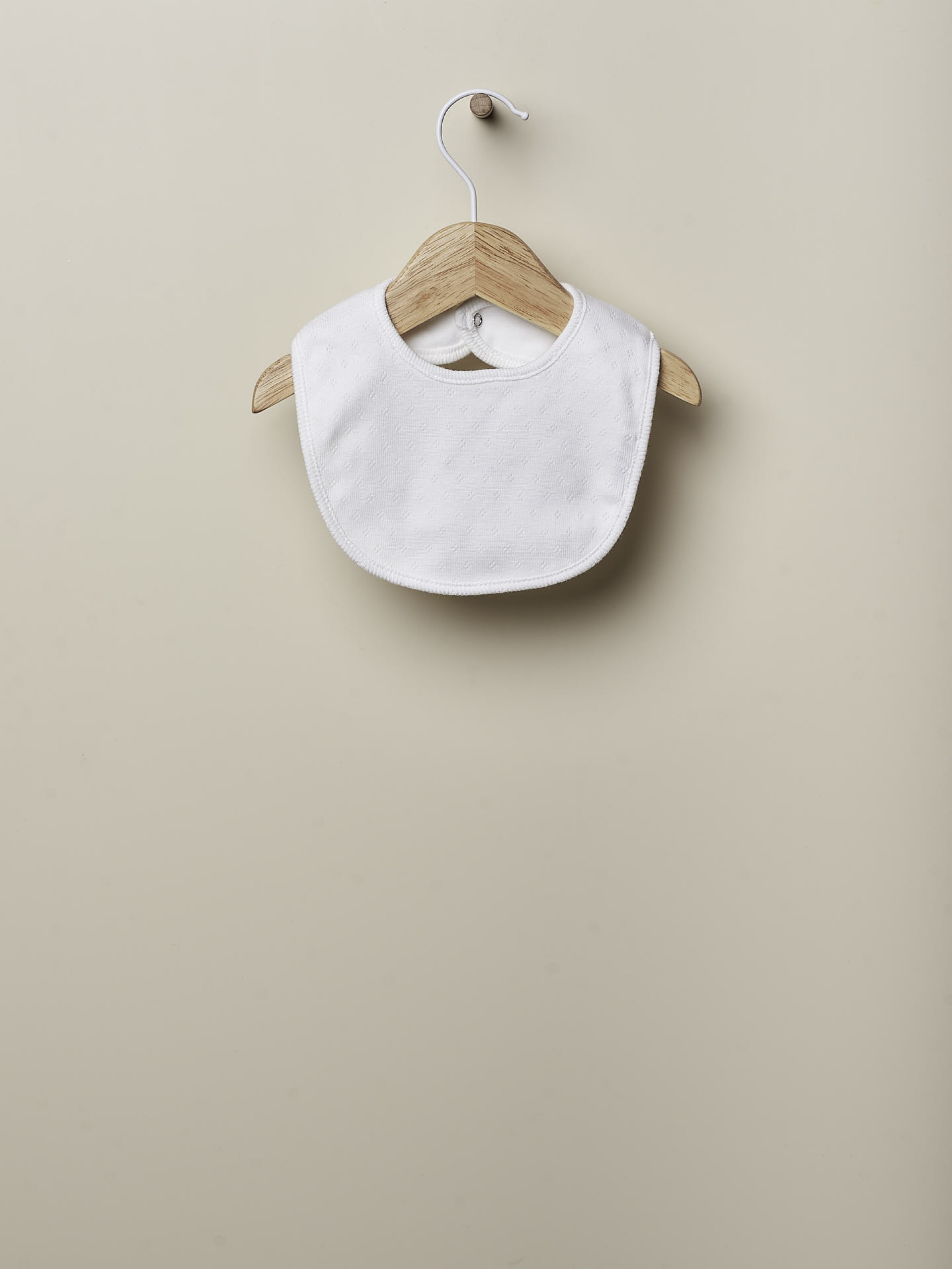 Babete de bebé em algodão