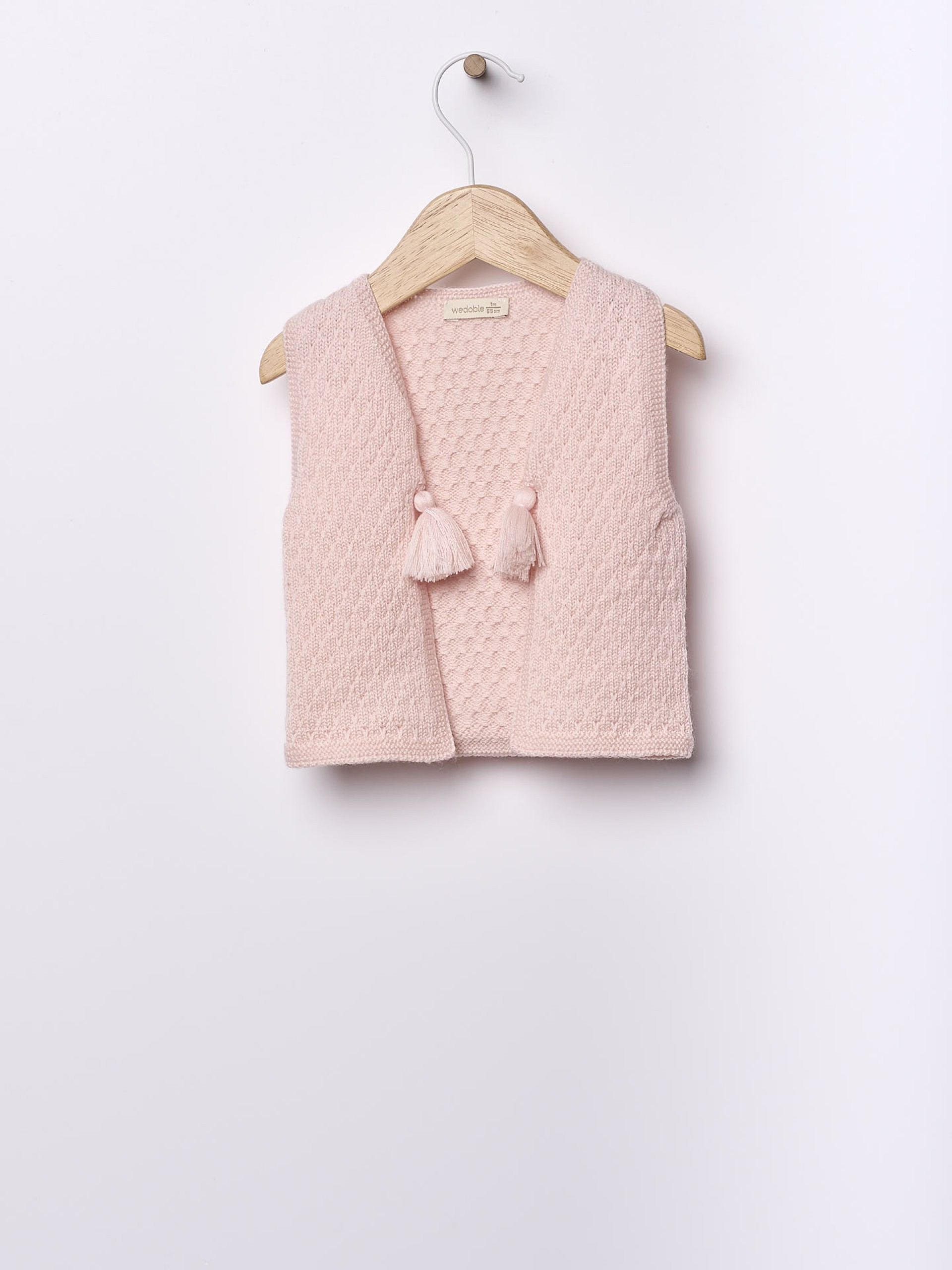 Knitted baby vest