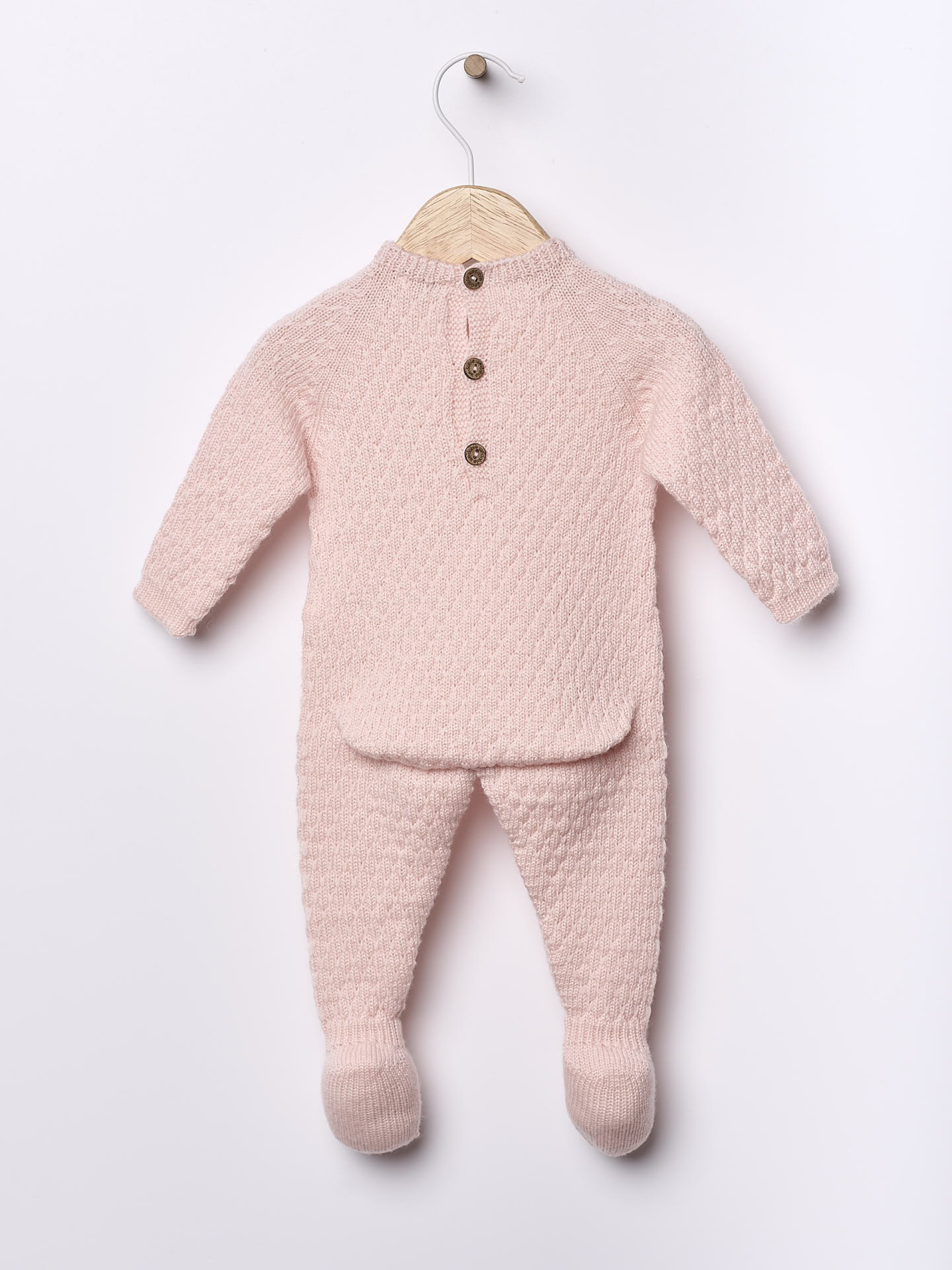 Knitted wool babygrow