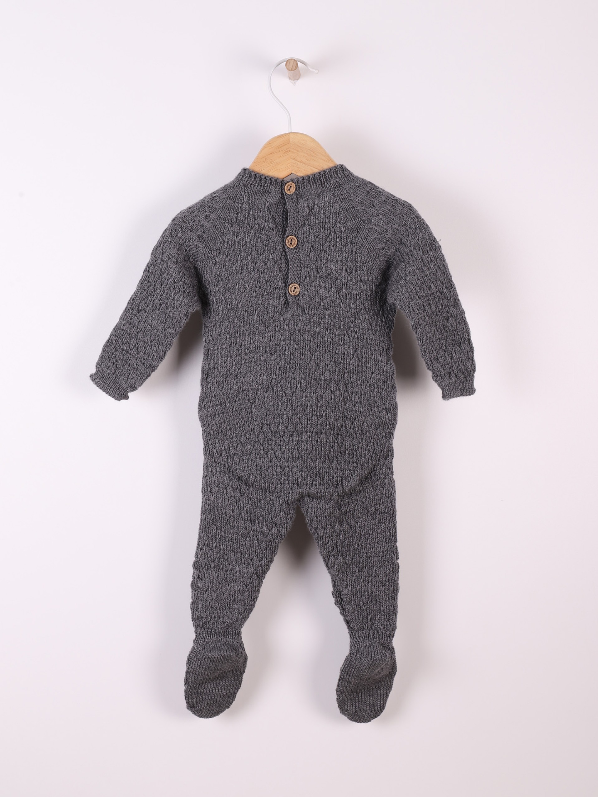 Knitted wool babygrow