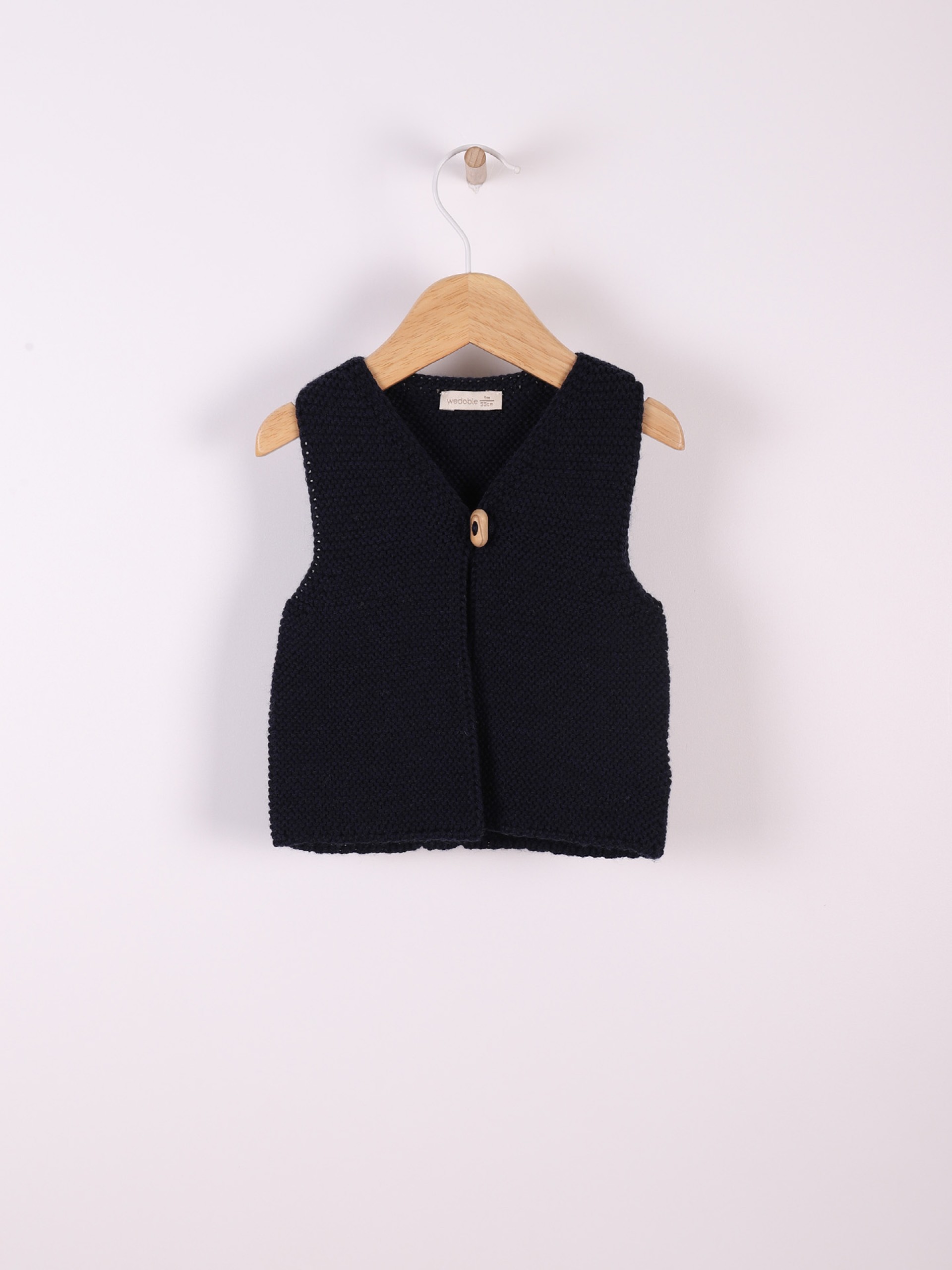 Knitted baby vest