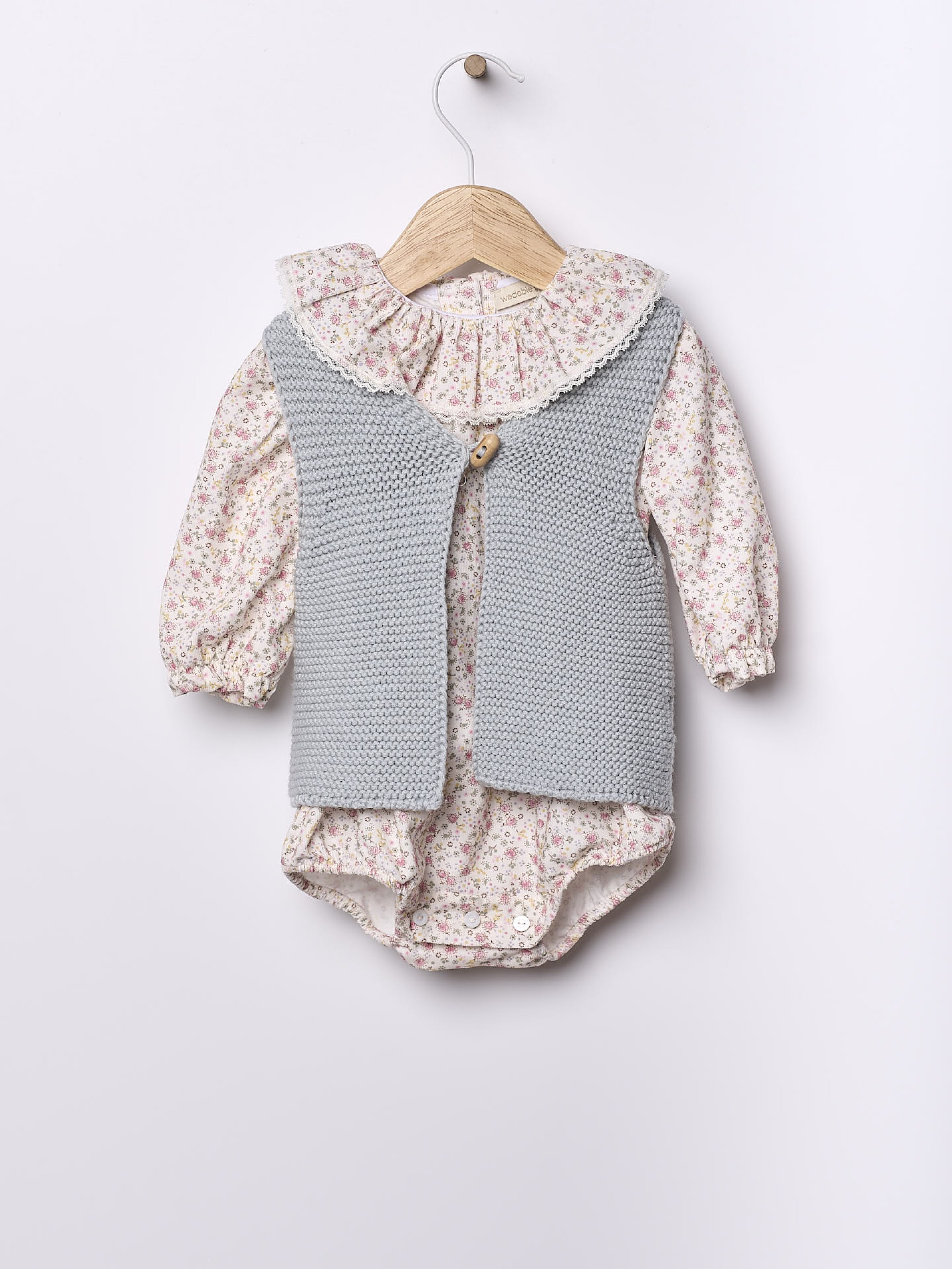 Knitted baby vest