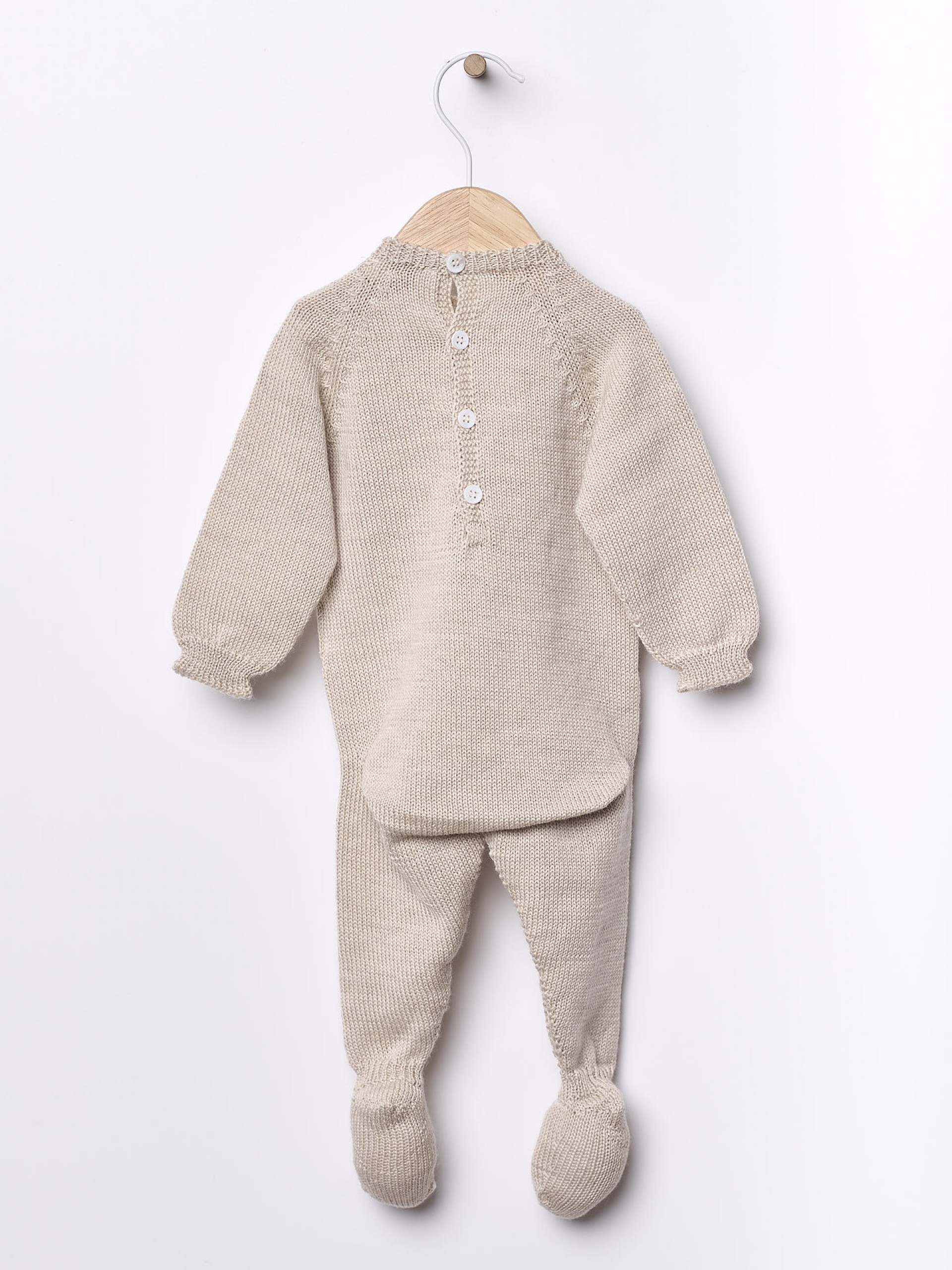 Knitted wool babygrow