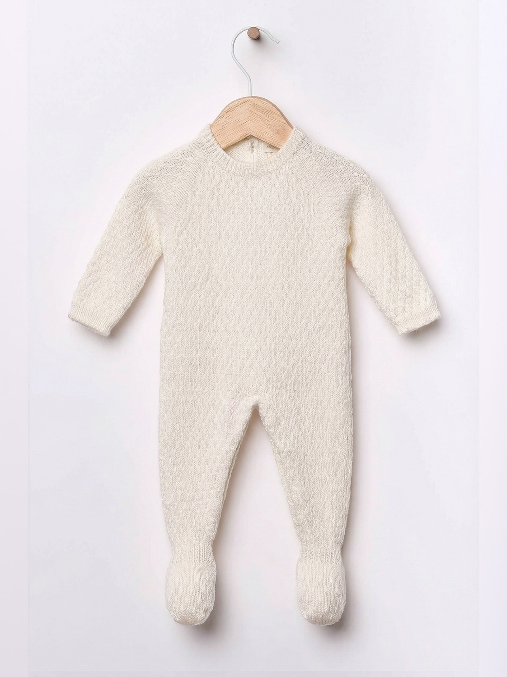 Knitted wool babygrow