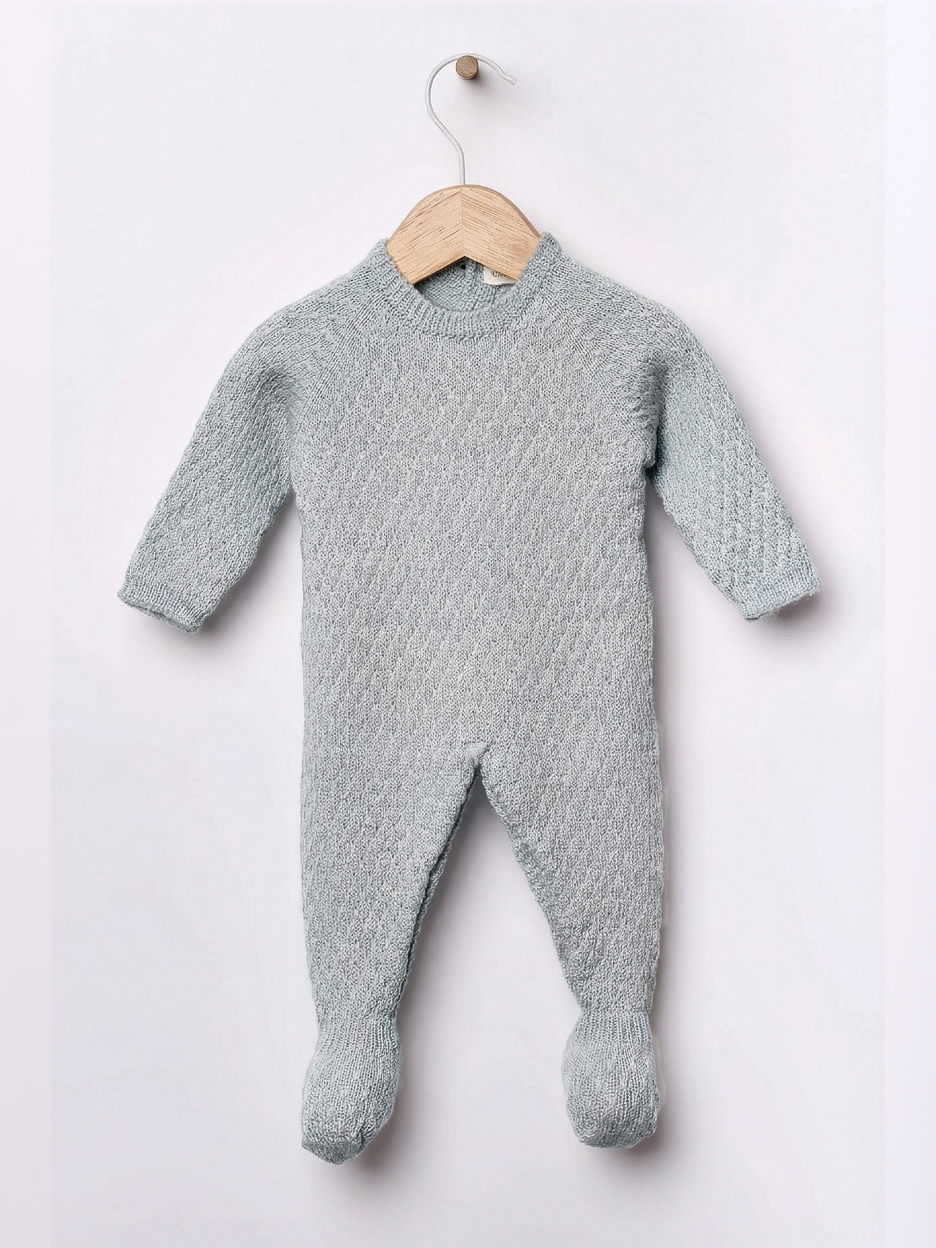Knitted wool babygrow