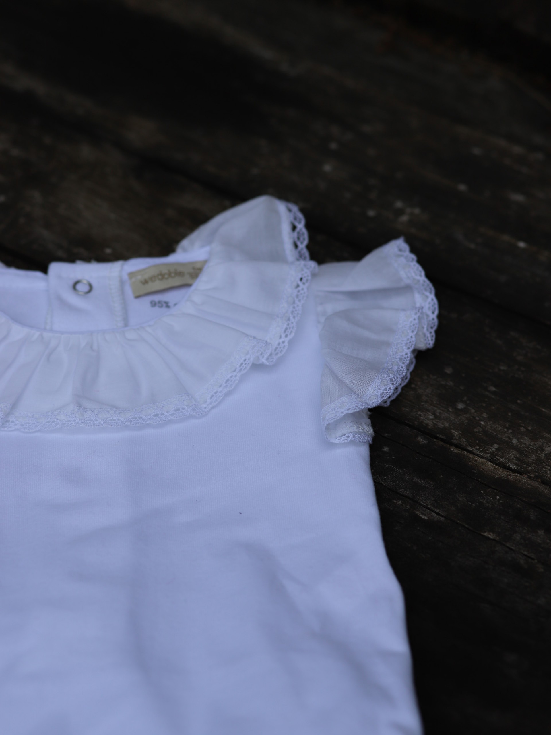 Ruffled bodysuit