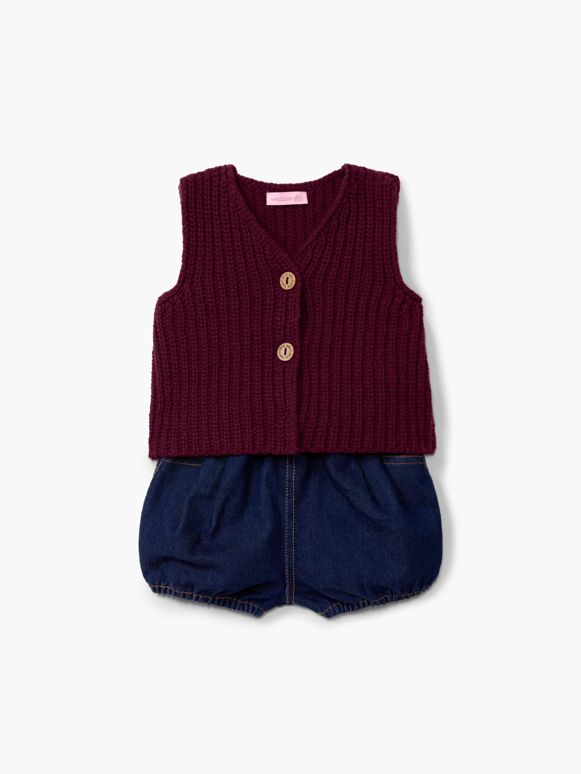 Knitted wool baby vest